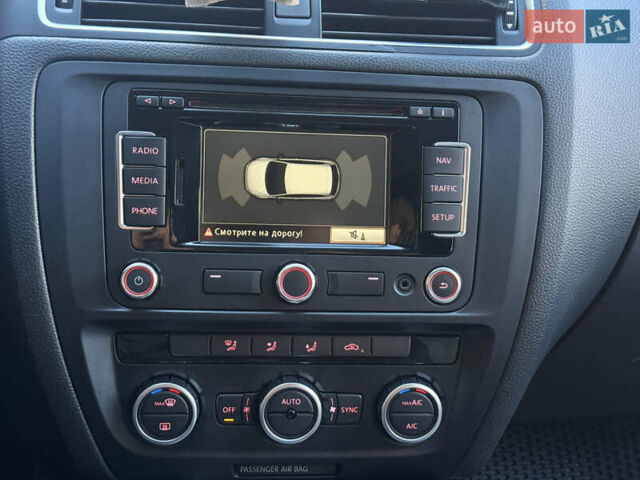 Черный Фольксваген Джетта, объемом двигателя 1.4 л и пробегом 170 тыс. км за 8700 $, фото 19 на Automoto.ua