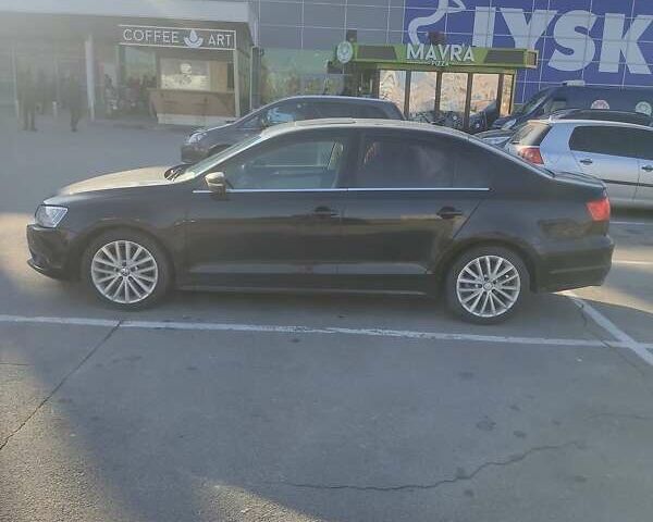 Фольксваген Джетта 2013 в Запорожье на Automoto.ua Черный Фольксваген Джетта, объемом двигателя 1.8 л и пробегом 150 тыс. км за 9200 $, фото 8 на Automoto.ua