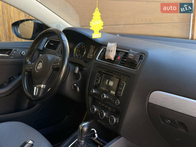 Черный Фольксваген Джетта, объемом двигателя 1.4 л и пробегом 170 тыс. км за 8700 $, фото 12 на Automoto.ua