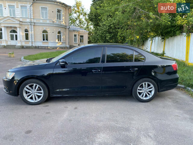 Черный Фольксваген Джетта, объемом двигателя 1.8 л и пробегом 256 тыс. км за 7500 $, фото 1 на Automoto.ua