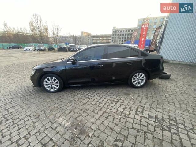 Черный Фольксваген Джетта, объемом двигателя 1.8 л и пробегом 168 тыс. км за 9200 $, фото 1 на Automoto.ua