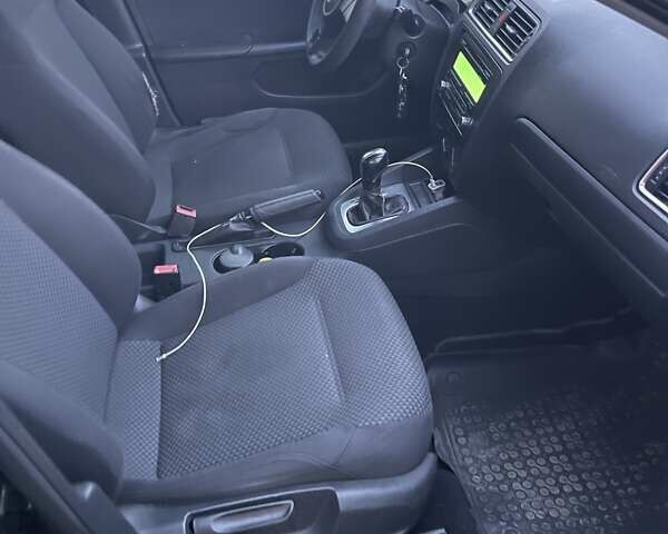 Чорний Фольксваген Джетта, об'ємом двигуна 2 л та пробігом 177 тис. км за 6950 $, фото 6 на Automoto.ua