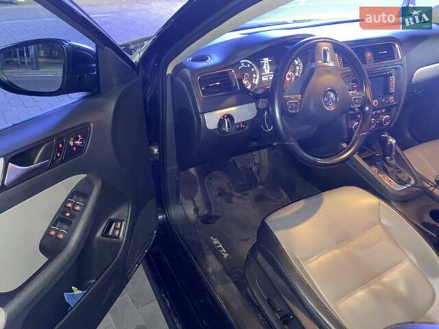 Черный Фольксваген Джетта, объемом двигателя 1.4 л и пробегом 184 тыс. км за 9800 $, фото 10 на Automoto.ua