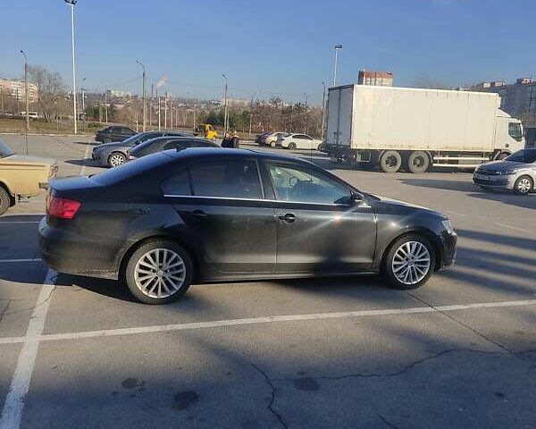 Фольксваген Джетта 2013 в Запорожье на Automoto.ua Черный Фольксваген Джетта, объемом двигателя 1.8 л и пробегом 150 тыс. км за 9200 $, фото 6 на Automoto.ua