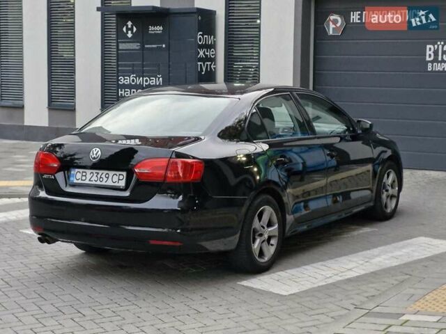 Фольксваген Джетта 2013 в Львове на Automoto.ua Черный Фольксваген Джетта, объемом двигателя 1.98 л и пробегом 228 тыс. км за 7999 $, фото 10 на Automoto.ua