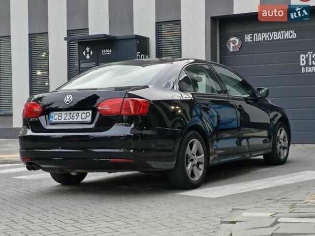 Фольксваген Джетта 2013 в Львове на Automoto.ua Черный Фольксваген Джетта, объемом двигателя 1.98 л и пробегом 228 тыс. км за 7999 $, фото 8 на Automoto.ua