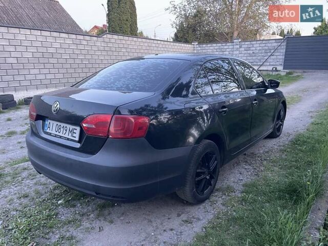 Чорний Фольксваген Джетта, об'ємом двигуна 2 л та пробігом 177 тис. км за 6950 $, фото 4 на Automoto.ua