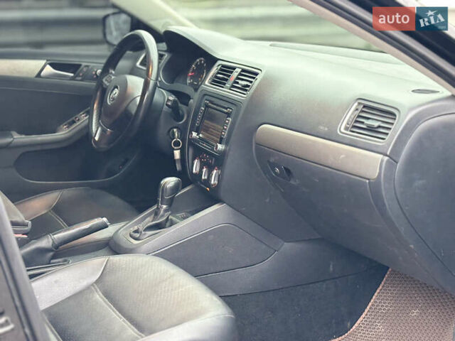 Чорний Фольксваген Джетта, об'ємом двигуна 1.8 л та пробігом 210 тис. км за 7400 $, фото 6 на Automoto.ua