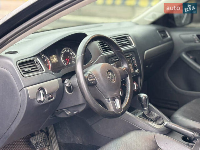 Чорний Фольксваген Джетта, об'ємом двигуна 1.8 л та пробігом 210 тис. км за 7400 $, фото 10 на Automoto.ua