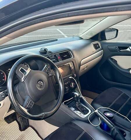 Чорний Фольксваген Джетта, об'ємом двигуна 1.8 л та пробігом 224 тис. км за 11200 $, фото 6 на Automoto.ua