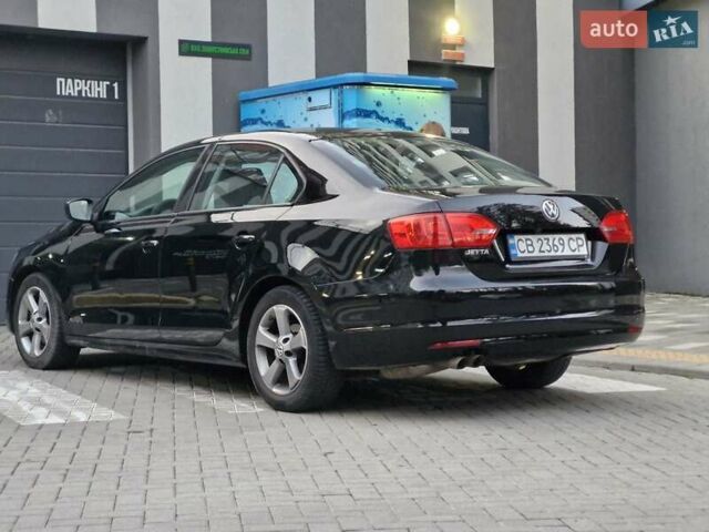 Фольксваген Джетта 2013 в Львове на Automoto.ua Черный Фольксваген Джетта, объемом двигателя 1.98 л и пробегом 228 тыс. км за 7999 $, фото 6 на Automoto.ua