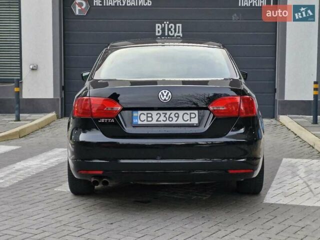 Фольксваген Джетта 2013 в Львове на Automoto.ua Черный Фольксваген Джетта, объемом двигателя 1.98 л и пробегом 228 тыс. км за 7999 $, фото 7 на Automoto.ua