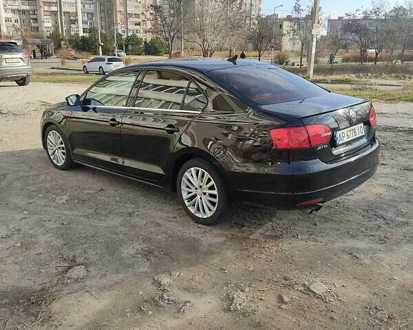 Фольксваген Джетта 2013 в Запорожье на Automoto.ua Черный Фольксваген Джетта, объемом двигателя 1.8 л и пробегом 150 тыс. км за 9200 $, фото 3 на Automoto.ua