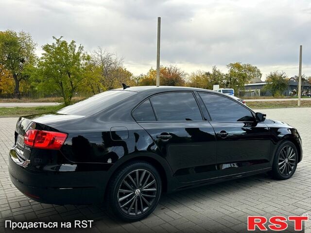 Фольксваген Джетта 2013 в Харькове на Automoto.ua Черный Фольксваген Джетта, объемом двигателя 2.5 л и пробегом 156 тыс. км за 11900 $, фото 2 на Automoto.ua