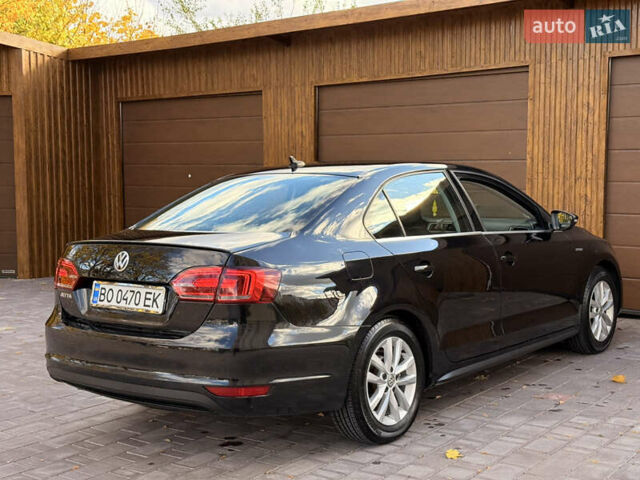 Фольксваген Джетта 2013 в Харькове на Automoto.ua Черный Фольксваген Джетта, объемом двигателя 1.4 л и пробегом 130 тыс. км за 9200 $, фото 7 на Automoto.ua