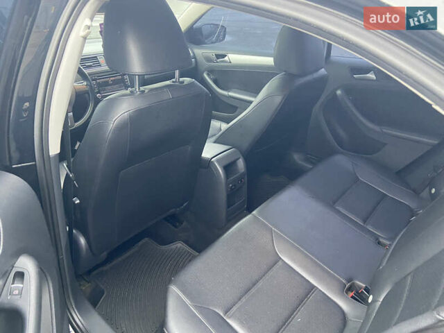 Черный Фольксваген Джетта, объемом двигателя 1.8 л и пробегом 185 тыс. км за 9900 $, фото 9 на Automoto.ua