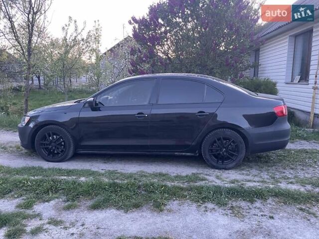 Чорний Фольксваген Джетта, об'ємом двигуна 2 л та пробігом 177 тис. км за 6950 $, фото 3 на Automoto.ua