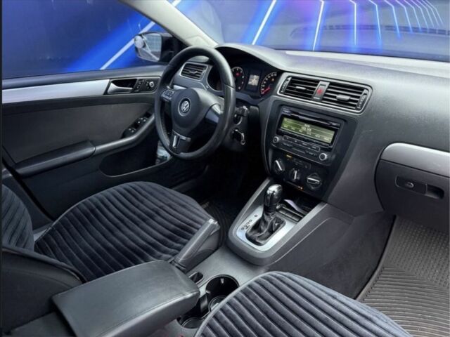 Чорний Фольксваген Джетта, об'ємом двигуна 2 л та пробігом 201 тис. км за 7499 $, фото 7 на Automoto.ua