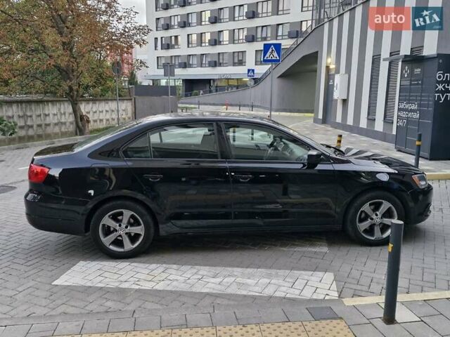 Фольксваген Джетта 2013 в Львове на Automoto.ua Черный Фольксваген Джетта, объемом двигателя 1.98 л и пробегом 228 тыс. км за 7999 $, фото 12 на Automoto.ua