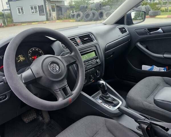 Фольксваген Джетта 2013 в Львове на Automoto.ua Черный Фольксваген Джетта, объемом двигателя 1.98 л и пробегом 228 тыс. км за 7999 $, фото 17 на Automoto.ua