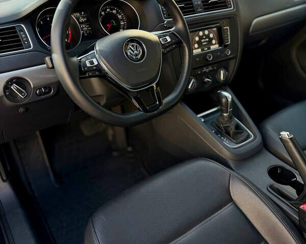 Черный Фольксваген Джетта, объемом двигателя 1.8 л и пробегом 180 тыс. км за 9599 $, фото 8 на Automoto.ua