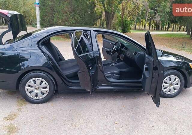 Фольксваген Джетта 2014 у Харкові на Automoto.ua Чорний Фольксваген Джетта, об'ємом двигуна 2 л та пробігом 151 тис. км за 9000 $, фото 17 на Automoto.ua
