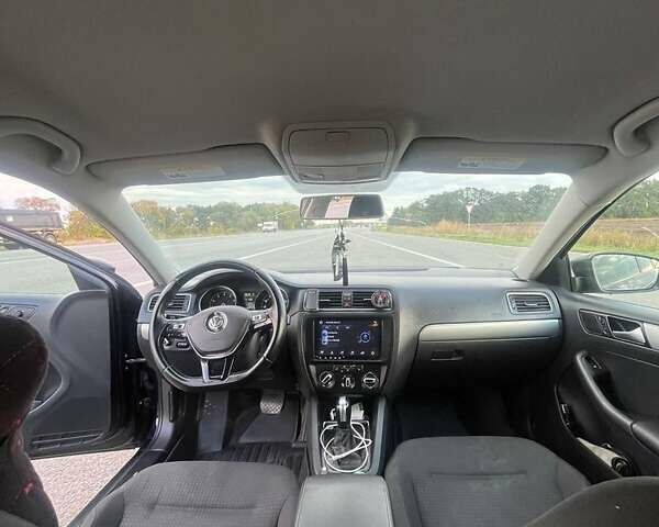 Черный Фольксваген Джетта, объемом двигателя 1.8 л и пробегом 180 тыс. км за 9800 $, фото 1 на Automoto.ua