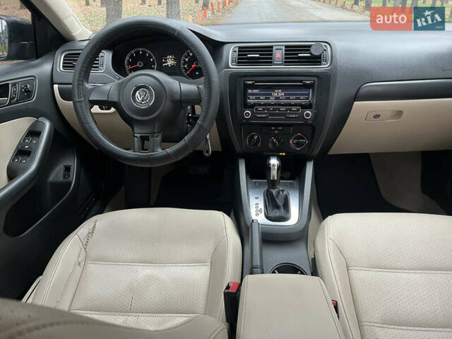 Черный Фольксваген Джетта, объемом двигателя 1.8 л и пробегом 200 тыс. км за 7499 $, фото 10 на Automoto.ua