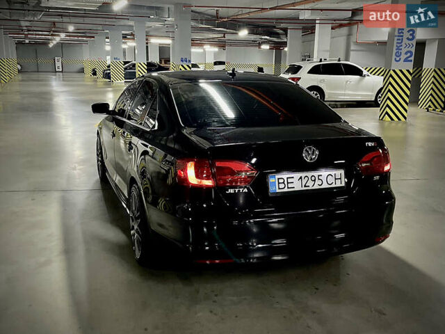 Черный Фольксваген Джетта, объемом двигателя 1.8 л и пробегом 188 тыс. км за 10000 $, фото 1 на Automoto.ua