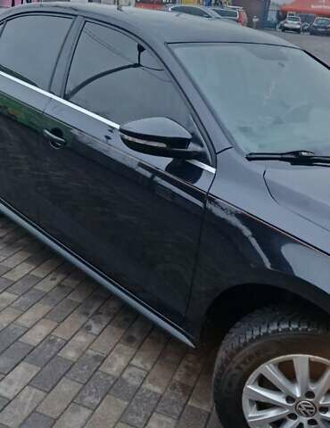 Чорний Фольксваген Джетта, об'ємом двигуна 1.4 л та пробігом 241 тис. км за 8599 $, фото 1 на Automoto.ua