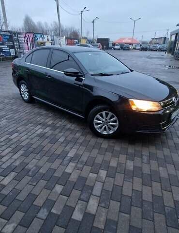Чорний Фольксваген Джетта, об'ємом двигуна 1.4 л та пробігом 241 тис. км за 8599 $, фото 2 на Automoto.ua