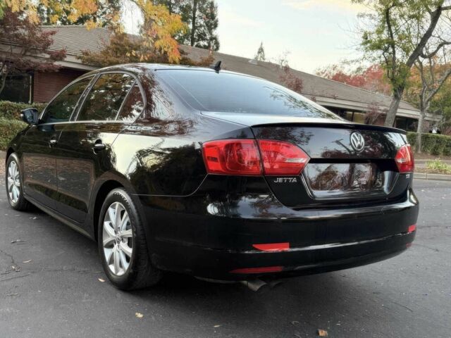 Черный Фольксваген Джетта, объемом двигателя 1.8 л и пробегом 86 тыс. км за 7000 $, фото 4 на Automoto.ua
