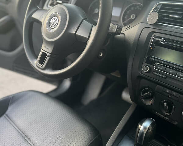 Фольксваген Джетта 2014 в Чернигове на Automoto.ua Черный Фольксваген Джетта, объемом двигателя 1.8 л и пробегом 192 тыс. км за 9500 $, фото 9 на Automoto.ua