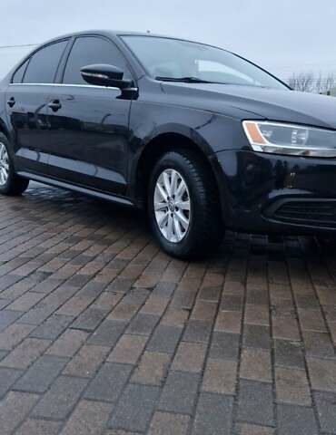 Чорний Фольксваген Джетта, об'ємом двигуна 1.4 л та пробігом 241 тис. км за 8599 $, фото 5 на Automoto.ua