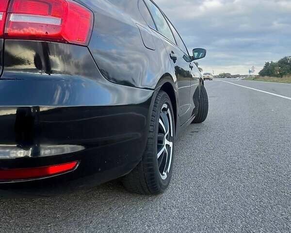 Черный Фольксваген Джетта, объемом двигателя 1.8 л и пробегом 180 тыс. км за 9800 $, фото 9 на Automoto.ua