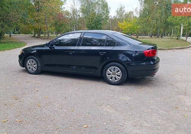 Фольксваген Джетта 2014 у Харкові на Automoto.ua Чорний Фольксваген Джетта, об'ємом двигуна 2 л та пробігом 151 тис. км за 9000 $, фото 8 на Automoto.ua