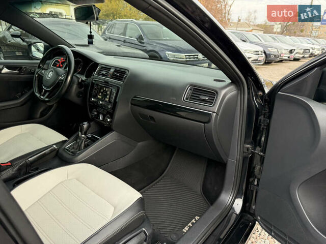 Чорний Фольксваген Джетта, об'ємом двигуна 1.8 л та пробігом 165 тис. км за 10999 $, фото 28 на Automoto.ua