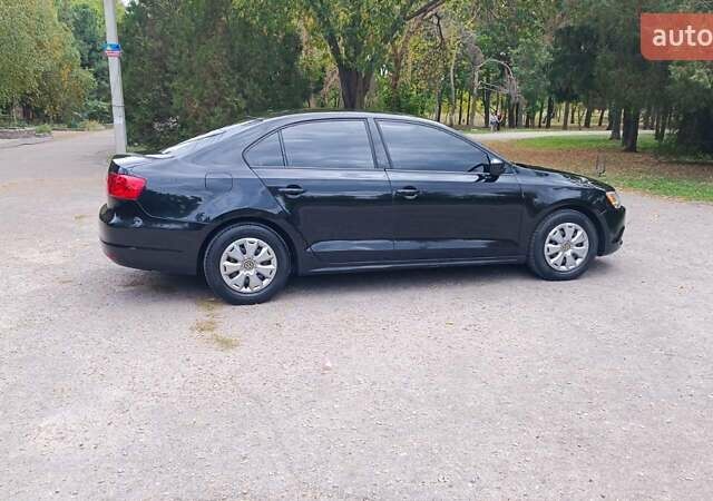 Фольксваген Джетта 2014 у Харкові на Automoto.ua Чорний Фольксваген Джетта, об'ємом двигуна 2 л та пробігом 151 тис. км за 9000 $, фото 16 на Automoto.ua