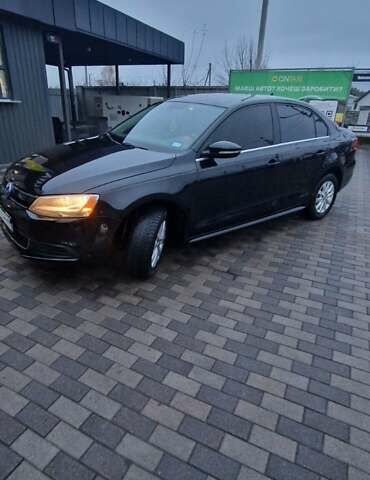 Чорний Фольксваген Джетта, об'ємом двигуна 1.4 л та пробігом 241 тис. км за 8599 $, фото 4 на Automoto.ua