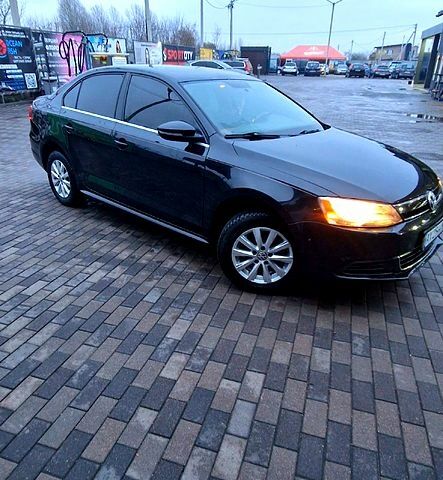 Чорний Фольксваген Джетта, об'ємом двигуна 1.4 л та пробігом 241 тис. км за 8599 $, фото 8 на Automoto.ua