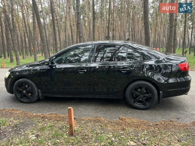 Черный Фольксваген Джетта, объемом двигателя 1.8 л и пробегом 200 тыс. км за 7499 $, фото 8 на Automoto.ua