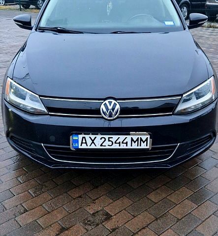 Чорний Фольксваген Джетта, об'ємом двигуна 1.4 л та пробігом 241 тис. км за 8599 $, фото 1 на Automoto.ua