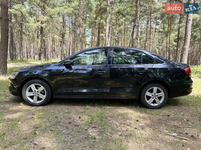 Чорний Фольксваген Джетта, об'ємом двигуна 1.6 л та пробігом 115 тис. км за 11300 $, фото 8 на Automoto.ua