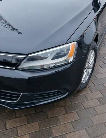 Чорний Фольксваген Джетта, об'ємом двигуна 1.4 л та пробігом 241 тис. км за 8599 $, фото 6 на Automoto.ua