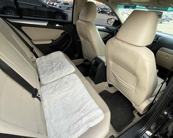 Черный Фольксваген Джетта, объемом двигателя 1.8 л и пробегом 125 тыс. км за 11500 $, фото 11 на Automoto.ua