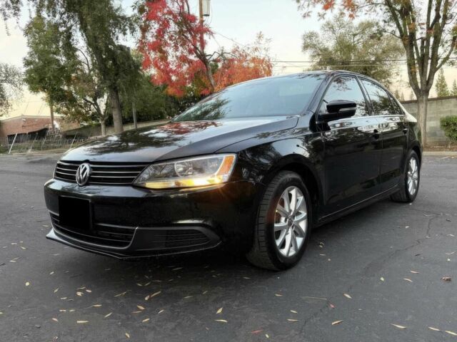 Черный Фольксваген Джетта, объемом двигателя 1.8 л и пробегом 86 тыс. км за 7000 $, фото 2 на Automoto.ua