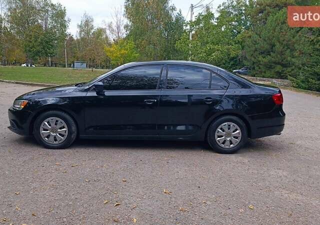 Фольксваген Джетта 2014 у Харкові на Automoto.ua Чорний Фольксваген Джетта, об'ємом двигуна 2 л та пробігом 151 тис. км за 9000 $, фото 7 на Automoto.ua