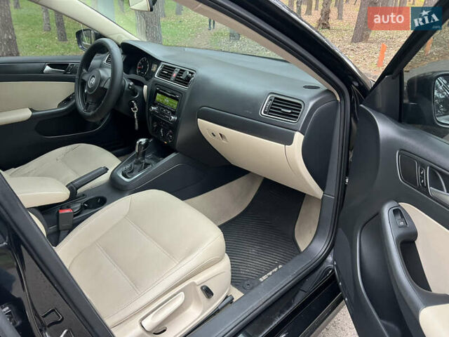 Черный Фольксваген Джетта, объемом двигателя 1.8 л и пробегом 200 тыс. км за 7499 $, фото 13 на Automoto.ua