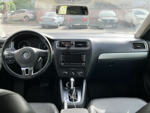 Черный Фольксваген Джетта, объемом двигателя 1.8 л и пробегом 142 тыс. км за 8500 $, фото 2 на Automoto.ua