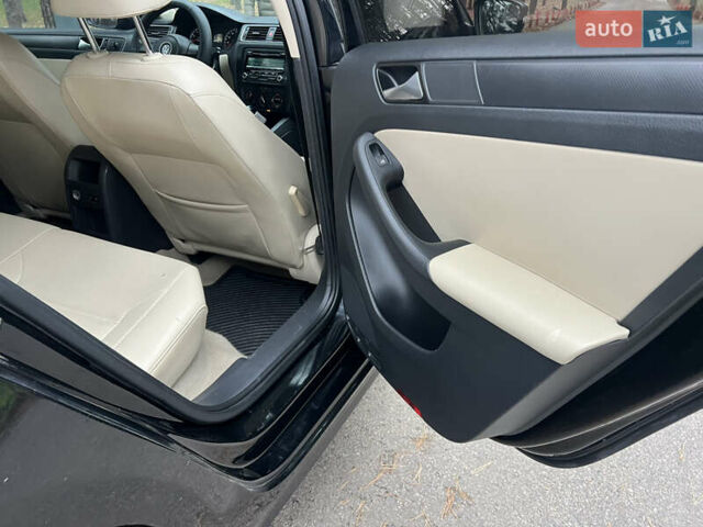 Черный Фольксваген Джетта, объемом двигателя 1.8 л и пробегом 200 тыс. км за 7499 $, фото 16 на Automoto.ua